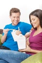 Couple eating Asian food. Royalty Free Stock Photo