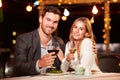 Couple eating dinner at rooftop restuarant Royalty Free Stock Photo