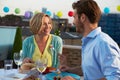 Couple Eating Evening Meal On Rooftop Terrace Royalty Free Stock Photo