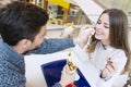 Couple eating in fast food restaurant Royalty Free Stock Photo