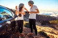 Couple eating having picnic near the car Royalty Free Stock Photo