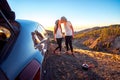 Couple eating having picnic near the car Royalty Free Stock Photo