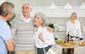 Couple of elderly man and woman greeting friends Royalty Free Stock Photo