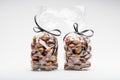 Couple of elegant plastic bags of fresh chestnuts for gift Royalty Free Stock Photo