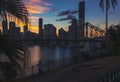 Couple on embankment during sunset