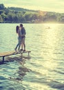 Couple embrace on the pier Royalty Free Stock Photo
