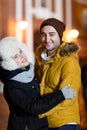 Couple embracing background of city Royalty Free Stock Photo