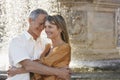 Couple Embracing By Fountain Royalty Free Stock Photo