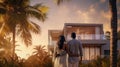 couple embracing in front of new big modern house, outdoor rear view back looking at their dream home Royalty Free Stock Photo