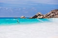 Couple enjoy the blue water of the sea in Seychelles