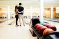 Couple enjoy bowling together Royalty Free Stock Photo