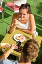 Couple enjoy coffee dessert restaurant terrace Royalty Free Stock Photo