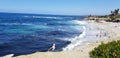 Beach time in the sun and sand on the Pacific Ocean - La Jolla, California Royalty Free Stock Photo