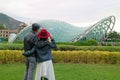 Couple Enjoy a Stunning View of the Bridge of Peace, an Outstanding Landmark of Tbilisi, Capital of Georgia