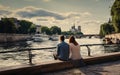 A couple enjoy sunset at the Seine in Paris Royalty Free Stock Photo