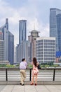 Couple enjoy the view on Bund Boulevard, Shanghai, China