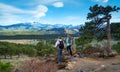 Couple enjoying beautiful scenery on hiking trip.