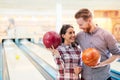 Couple enjoying bowling together Royalty Free Stock Photo