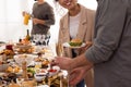 Couple enjoying brunch buffet together indoors, closeup Royalty Free Stock Photo