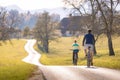 Couple enjoying cycling in the countryside during fall weekend trip