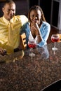 Couple enjoying drinks at a bar Royalty Free Stock Photo