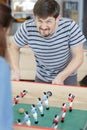 couple enjoying game table football Royalty Free Stock Photo