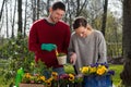 Couple enjoying garden work