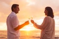 Couple Enjoying Glass of Champene on the Beach at