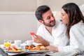 Couple enjoying hotel room service. Royalty Free Stock Photo