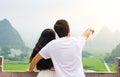 Couple enjoying Karst mountain view together