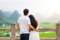 Couple enjoying Karst mountain view together