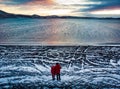 Couple enjoying Kleifarvatn lake view in Iceland