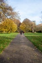 A couple enjoying a lovely walk together in regents park UK