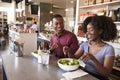 Couple Enjoying Lunch Date In Delicatessen Restaurant Royalty Free Stock Photo