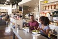 Couple Enjoying Lunch Date In Delicatessen Restaurant Royalty Free Stock Photo