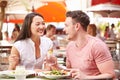 Couple Enjoying Lunch In Outdoor Restaurant Royalty Free Stock Photo