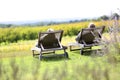 Couple enjoying quiet moment in long chairs