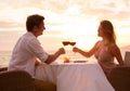Couple enjoying romantic sunnset dinner Royalty Free Stock Photo