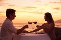 Couple enjoying romantic sunnset dinner Royalty Free Stock Photo