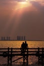 Couple Enjoying Romantic Sunset Royalty Free Stock Photo