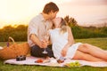 Couple Enjoying Romantic Sunset Picnic Royalty Free Stock Photo