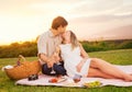 Couple Enjoying Romantic Sunset Picnic Royalty Free Stock Photo