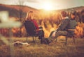 Couple Enjoying Scenic Vista From Their Camping Chairs