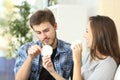 Couple enjoying and suffering diet