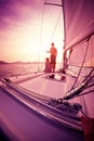 Couple enjoying sunset from the sail boat Royalty Free Stock Photo