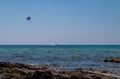 Water activities parachute over the Ionian Sea in Marina di Salve, Puglia, Italy.