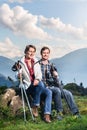 Couple enjoying view hiking in the mountains Royalty Free Stock Photo