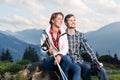 Couple enjoying view hiking in the mountains