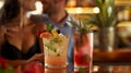A couple enjoys a quiet evening at the nonalcoholic bar sipping on mocktails garnished with fresh fruits and herbs Royalty Free Stock Photo