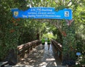 Couple Enters The Ding Darling Education Center Walkway